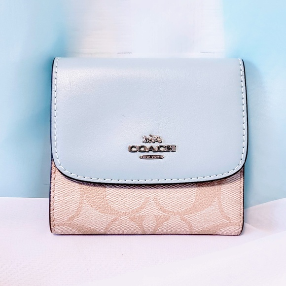 Coach Handbags - Coach Signature Emma fold wallet 🆕🦄